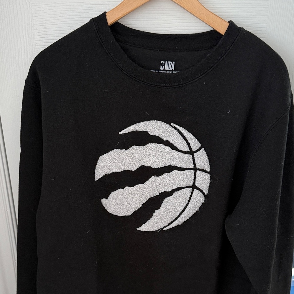 NBA Raptors Black Crewneck Sweater with White Embossed Logo